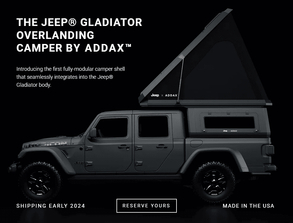 jeep gladiator with camper shell and rooftop tent.